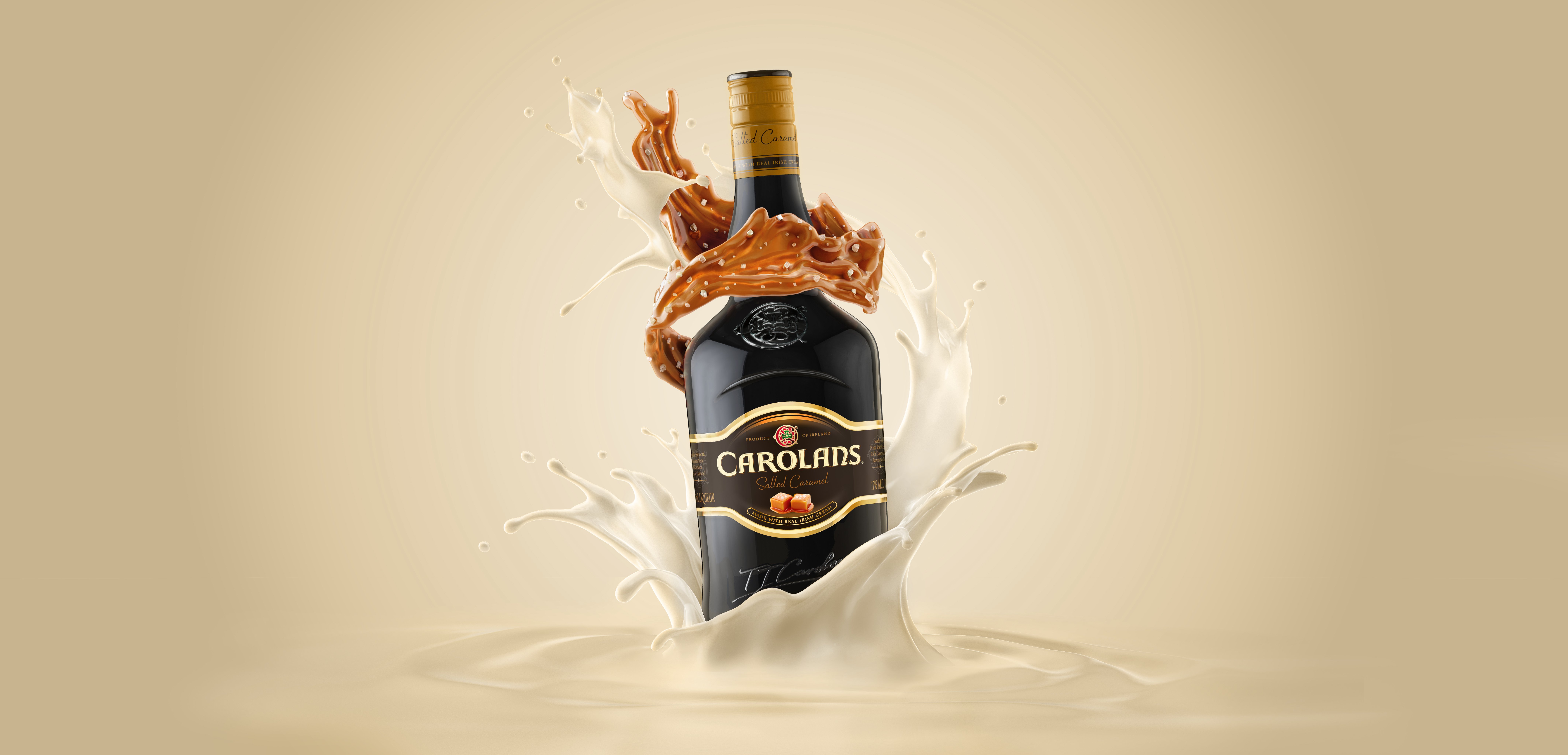 Carolans Irish Cream and Salted Caramel flavored beverage. The bottle is imaged with irish cream and salted caramel swirls curved around the bottle.
