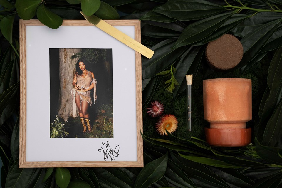 SZA Performance Seeding Kit Contents next to a signed, framed photo of SZA.